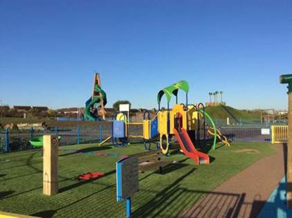 A playground with slides and a slide