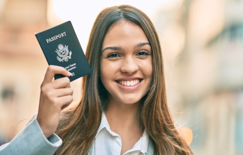 Teen girl holding passport